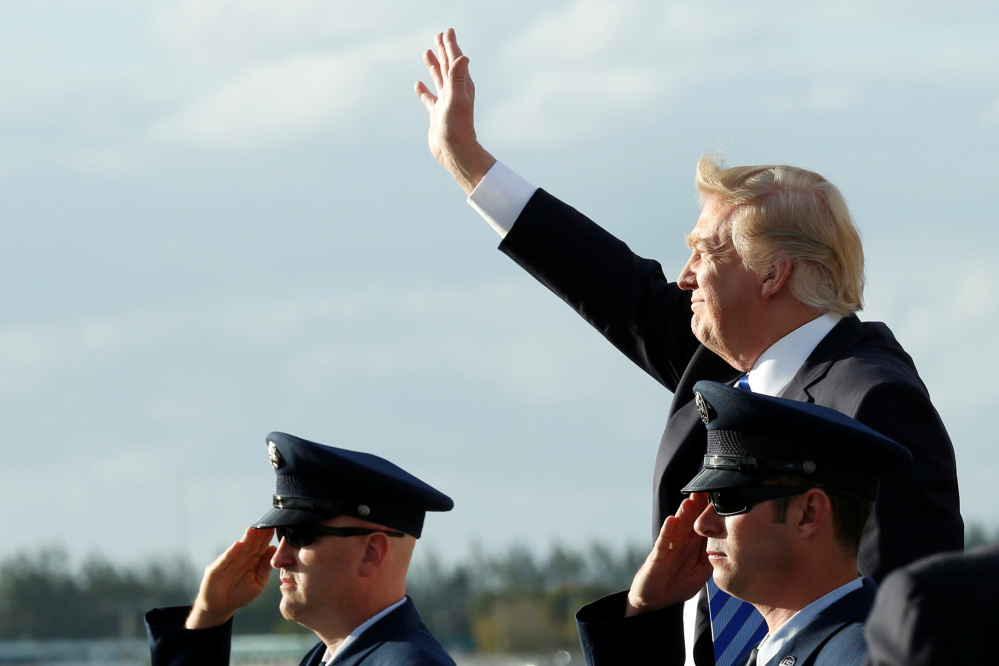 President Trump arrives to board Air Force One on Thursday at Joint Base Andrews outside Washington, D.C., before traveling to Palm Beach, Fla., for the Easter weekend.