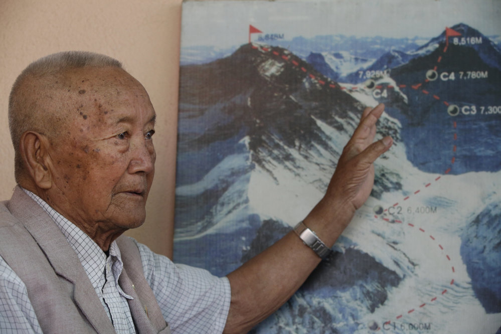 Nepalese climber Min Bahadur Sherchan points to the trail to Mount Everest in this recent photo taken in Kathmandu, Nepal. 