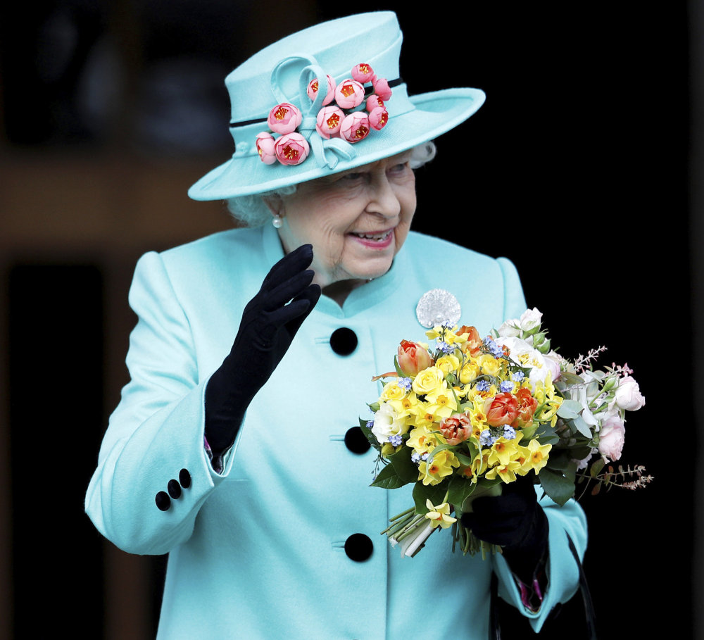 Associated Press/Peter Nicholls
Britain's Queen Elizabeth II, seen on Easter Sunday, in Windsor, England, celebrated her birthday on Friday with family outing at the races. At age 91, she is the world's longest-living monarch.