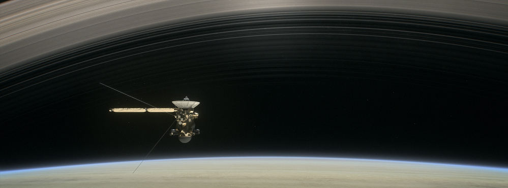 This image made available by NASA shows a still from the short film "Cassini's Grand Finale," with the spacecraft diving between Saturn and the planet's innermost ring.
