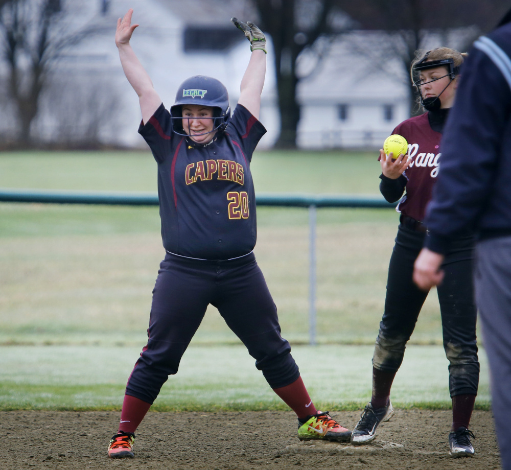Elena Keller of Cape Elizabeth holds up at second after hitting a double in the sixth inning. The Capers collected 12 hits in their season-opening victory.