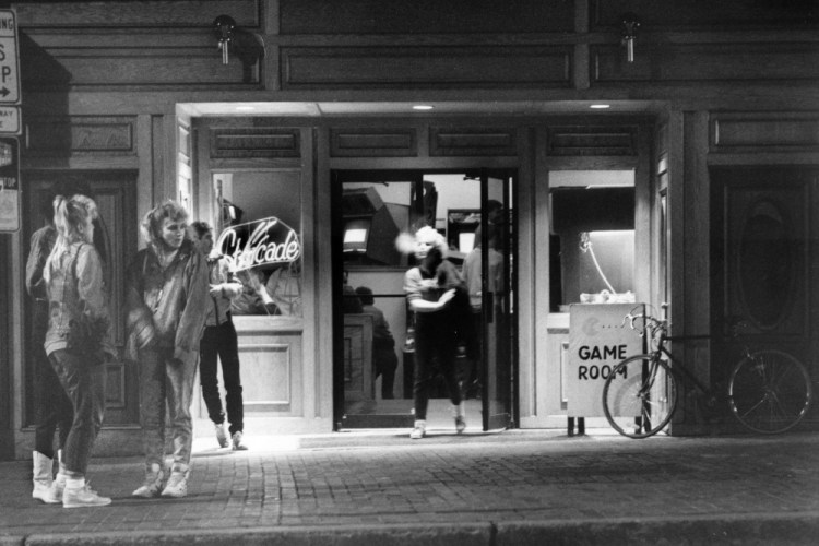 Young people gather outside Starcade, a video-game parlor on Portland's Congress Street, in 1988. Thirty years ago, the city was "sort of a rough-and-tumble wharf town" in which troubled youths sometimes lived on the streets.