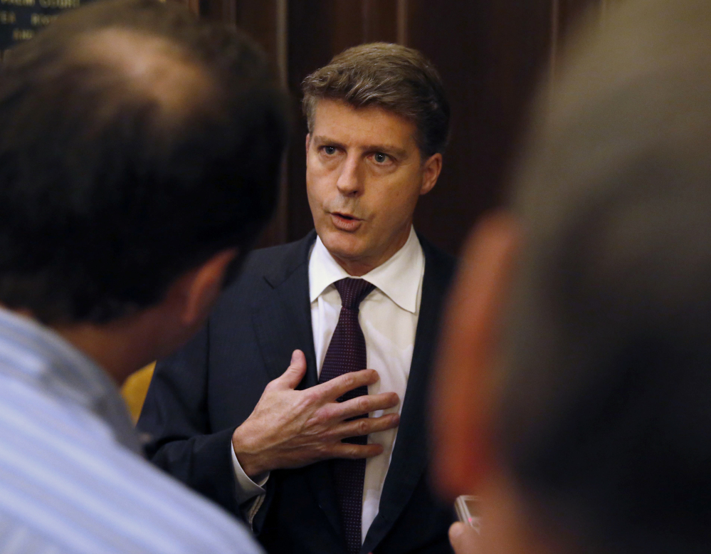 AP photo
Hal Steinbrenner, owner of the New York Yankees, talks with reporters during the 2016 baseball owners meetings at the Drake Hotel in Chicago.