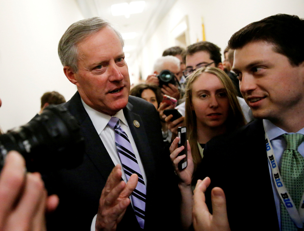 House Freedom Caucus Chairman Mark Meadows, left, is one of several conservative Republicans working with moderate members to craft a health-care bill.
Reuters/Jonathan Ernst