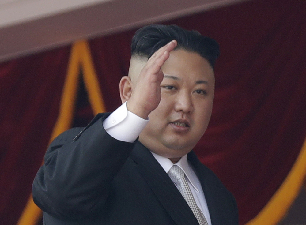 North Korean leader Kim Jong Un, waving during a military parade April 15 in Pyongyang, is showing determination to make technical progress on his weapons programs and defiance of international pressure.