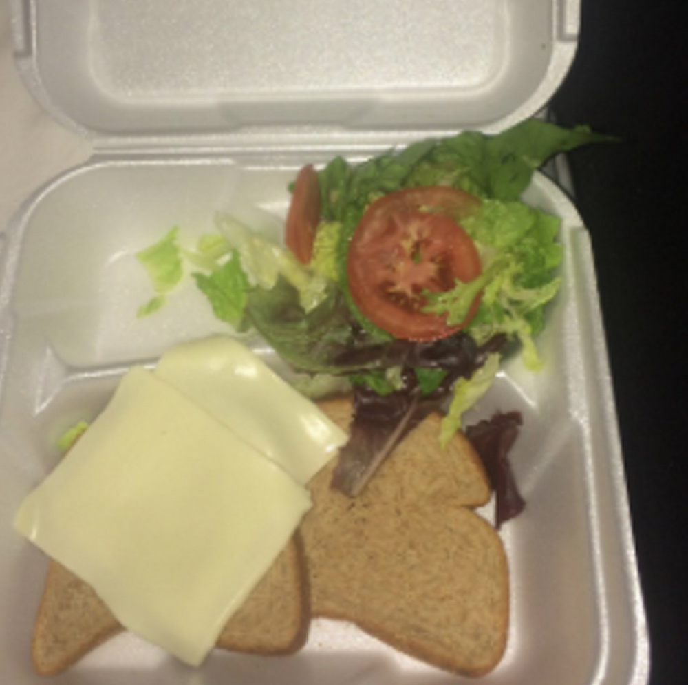 A meal provided to a Fyre Festival concert-goer consisting of bread, cheese and lettuce.
