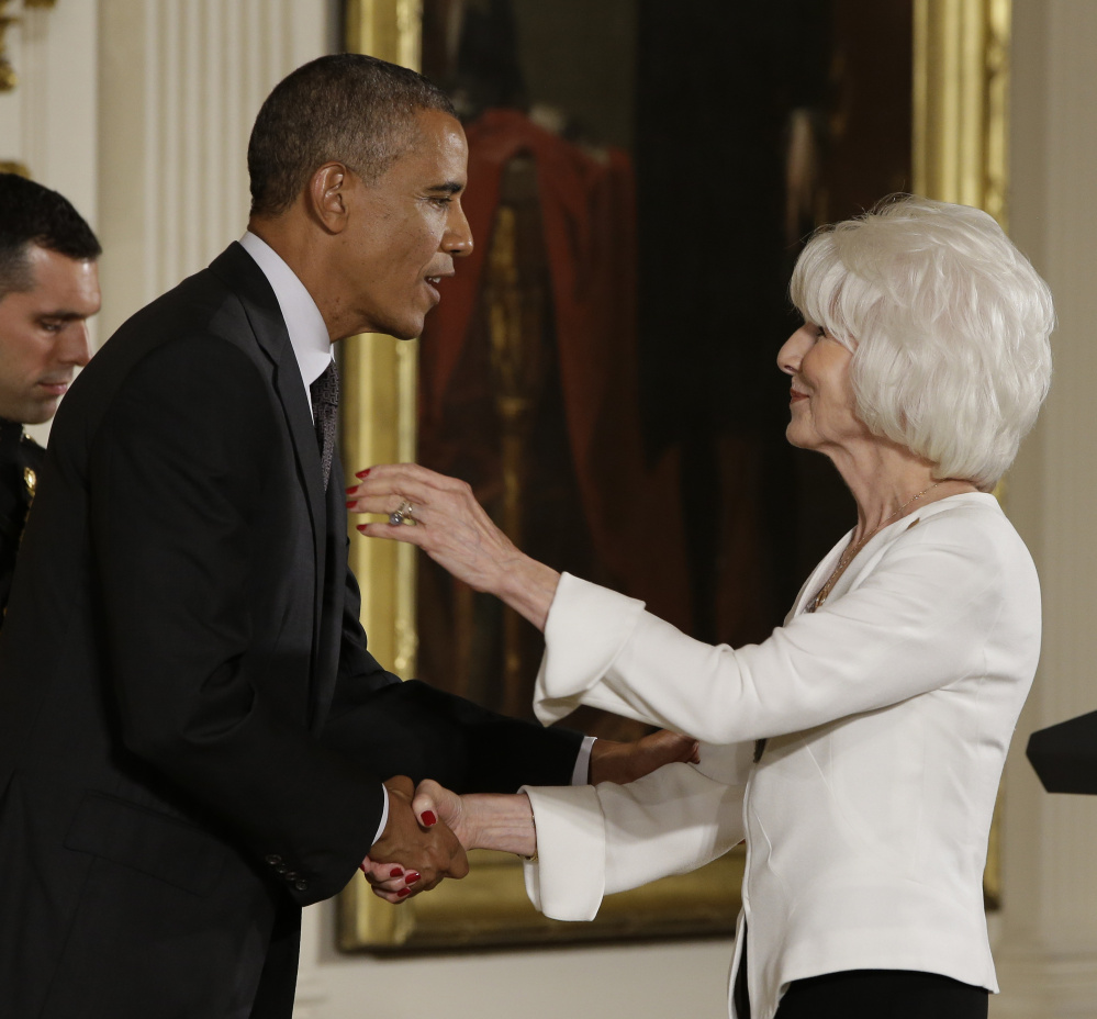 President Barack Obama awards the 2013 National Humanities Medal to longtime NPR radio host Diane Rehm in the East Room at the White House in July. Rehm recently got engaged at age 80.