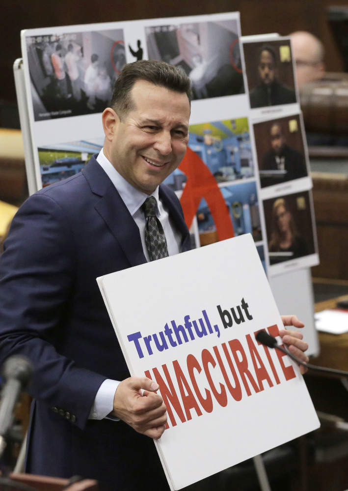 Defense attorney Jose Baez holds a placard while presenting closing arguments in the trial of former New England Patriots tight end Aaron Hernandez in Boston. Baez won an acquittal for Hernandez in the double-murder case, and for Casey Anthony in 2011 in the death of her toddler.
