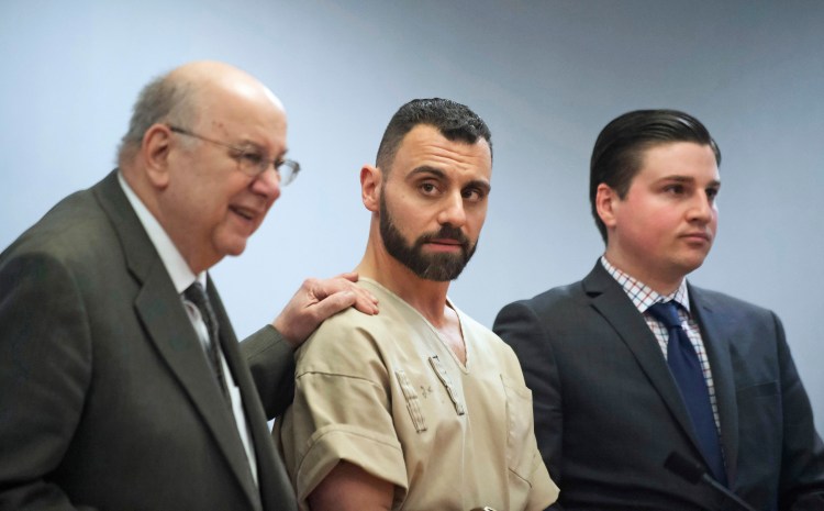 Richard Dabate, center, appears with attorneys while being arraigned on April 17, 2017, in Rockville Superior Court in Vernon, Connecticut.