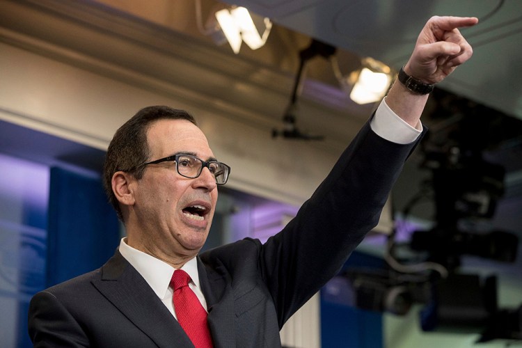 Treasury Secretary Steve Mnuchin takes a question in the briefing room of the White House, where he discussed President Trump's tax proposals Wednesday. 