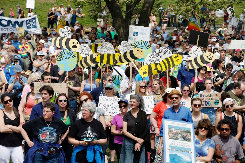 People gather for Boston's People's Climate March on Boston Common on Saturday.