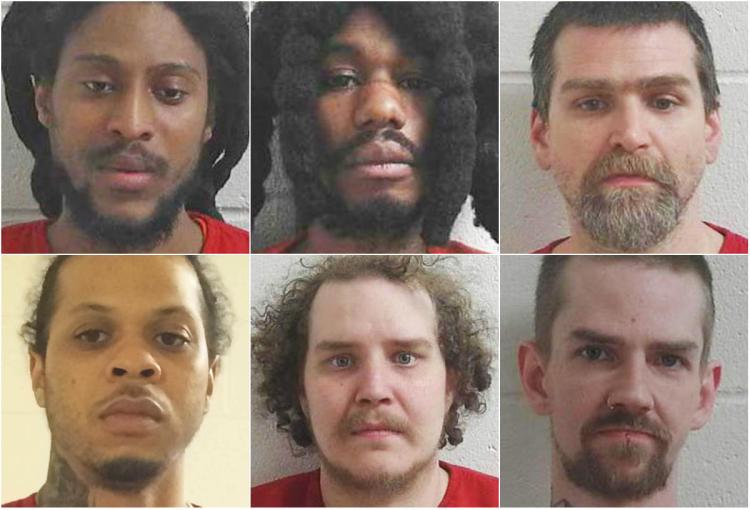 Left to right, top: Jerry Philogene, Peguy Pacouloute, Travis Tidswell. Bottom: Derrell E. "Slim" Weathers, Joshua "Tiny" Campbell, Glen Lane