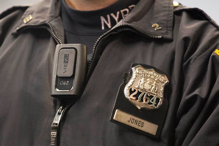 New York Police Department officer Joshua Jones wears a VieVu body camera at a 2014 news conference in New York. 