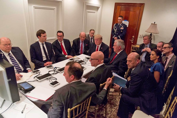 President Trump and his  national security team are briefed via videoconference by Gen. Joseph Dunford, chairman of the Joint Chiefs of Staff, on the missile strike on Syria. The meeting took place in the Sensitive Compartmented Information Facility at Trump's Mar-a-Lago resort in West Palm Beach. White House Press Secretary Sean Spicer said the image was digitally edited for security purposes.
