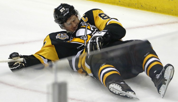 Sidney Crosby suffered a concussion Monday night when he was cross-checked by Washington's Matt Niskanen. Crosby is out for Wednesday's Game 4 with the Penguins holding a 2-1 series lead.