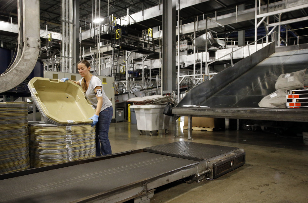 A UPS employee works inside the company's Worldport hub in Louisville, Ky., in this 2015 photo. In a positive sign for the U.S. economy, the number of part-time workers who want full-time jobs reached its lowest point in nine years.