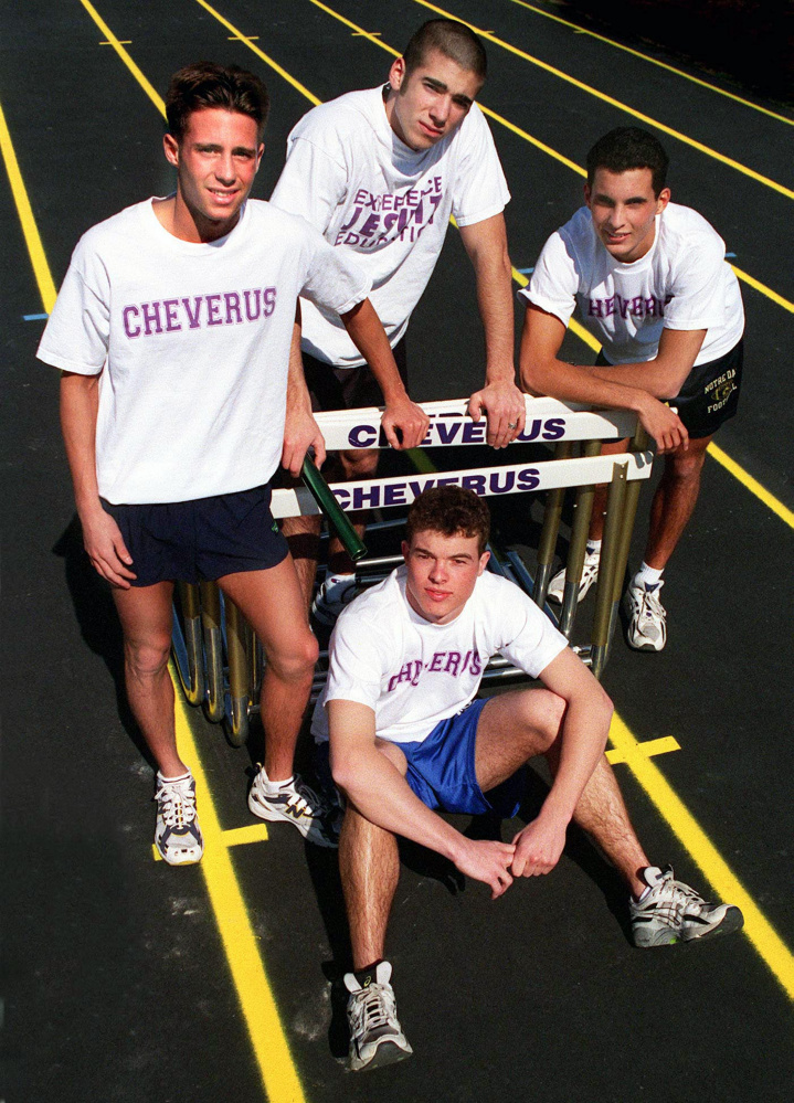 A Press Herald file photo shows Kyle Milliken (seated, front) with the state-record-setting Cheverus High School relay team in April 1998. Also pictured, standing from left, are Ryan Toothaker, Nick Nappi, and Ryan Demers.