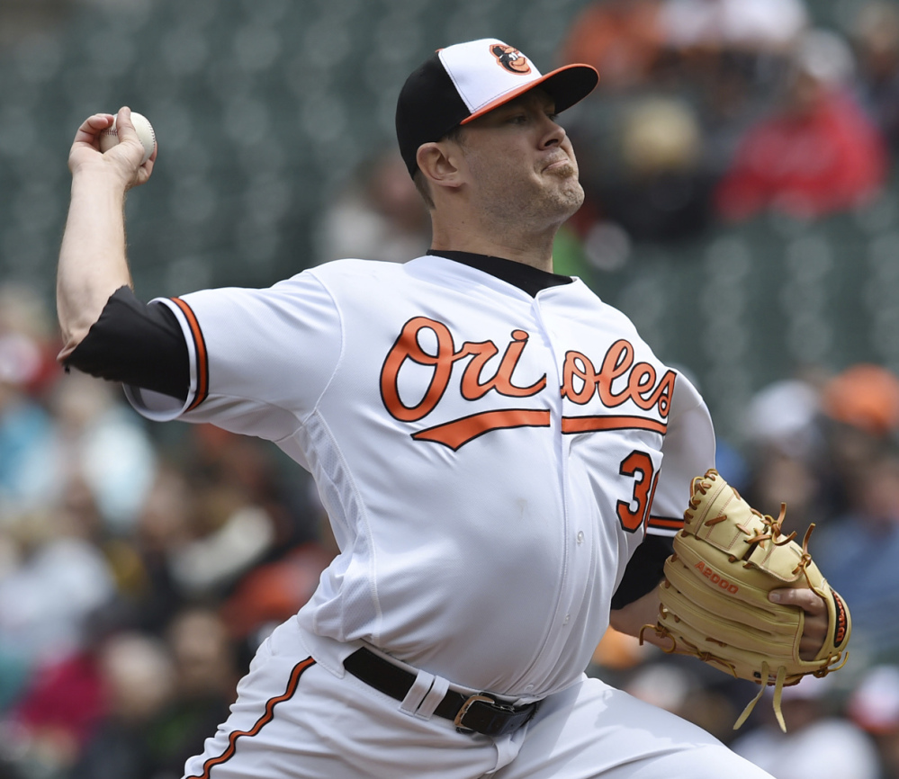 Associated Press/Gail Burton
Chris Tillman made his first start of the season Sunday, helping the Orioles beat the Chicago White Sox 4-0 in Baltimore to complete a three-game sweep.
