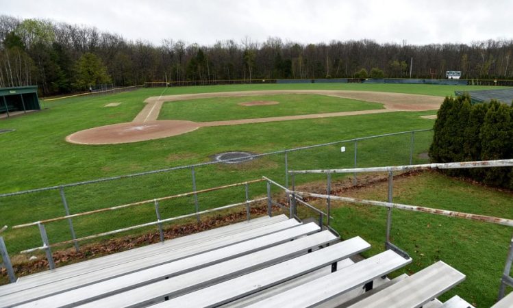 The baseball field at Winslow High School in Winslow is sodden on Saturday as rain falls, yet again.