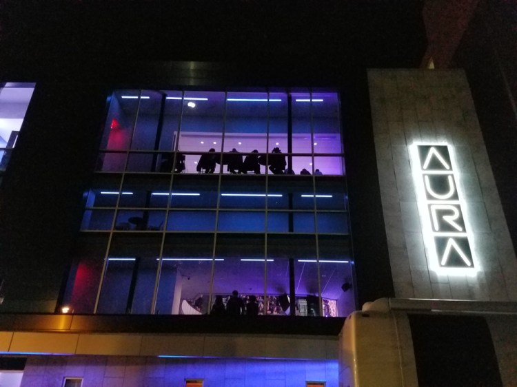 The new Aura's lit facade on the night of Dwight Yoakam's performance.