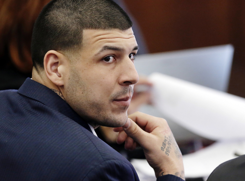 Aaron Hernandez during his double murder trial in Suffolk Superior Court, in Boston.  A judge ereased his 2013 murder conviction citing a ruling in Massachusetts case law.