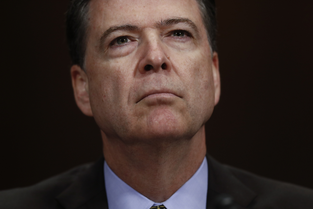 James Comey pauses as he testifies May 3 on Capitol Hill before the Senate Judiciary Committee. President Trump abruptly fired Comey on Tuesday, ousting the nation's top law enforcement official in the midst of an investigation into whether Trump's campaign had ties to Russia's election meddling.