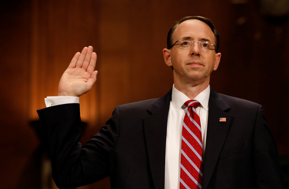 Deputy Attorney General Rod Rosenstein testifies before the Senate Judiciary Committee in March. Several former Justice Department officials who know Rosenstein said he did what he thought was right when he authored the rationale for firing FBI Director James Comey.