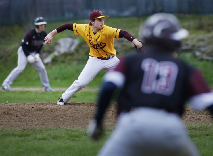 Cape Elizabeth pitcher Sean Agrondia bears down Wednesday with runners at first and third base. Agrondia allowed three hits in five shutout innings as the Capers defeated Freeport, 10-0.