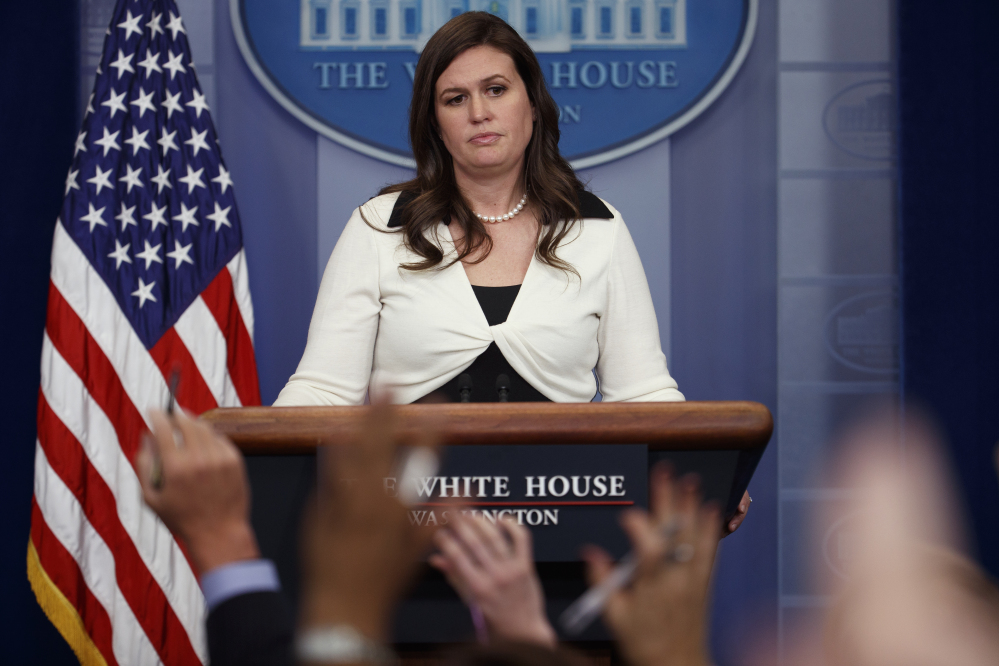Deputy White House press secretary Sarah Huckabee Sanders speaks during Thursday's press briefing at the White House. Sanders insisted she had heard from "countless" members of the FBI who welcomed the president's firing of James Comey. The bureau's acting director told a Senate committee that's not true.
