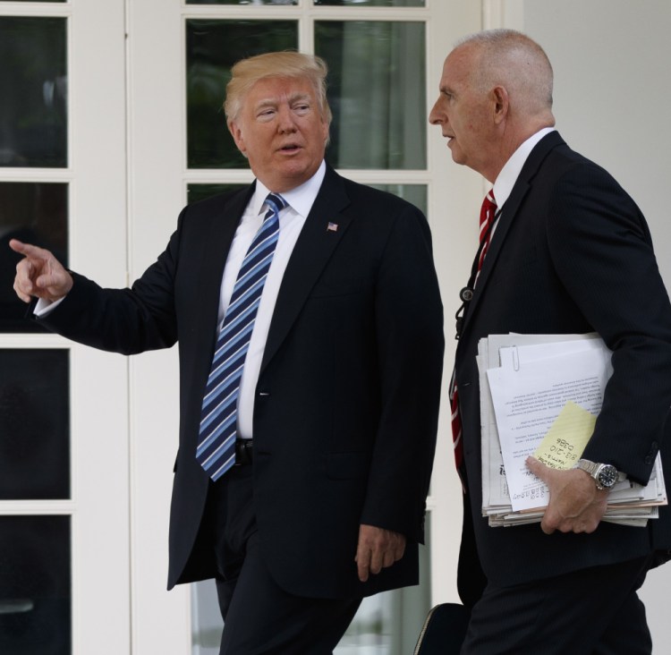 President Trump walks with aide Keith Schiller at the White House in May.