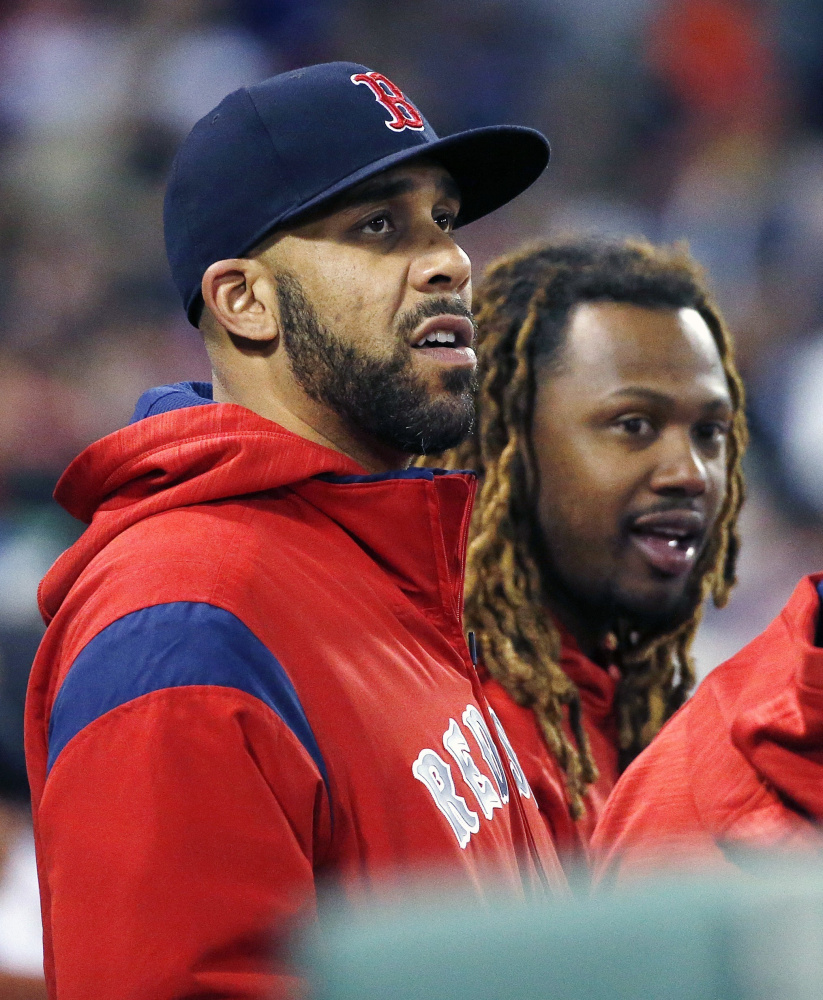 David Price, left, has not pitched and Hanley Ramirez has not been unable to play first base, yet Boston is still within striking distance.