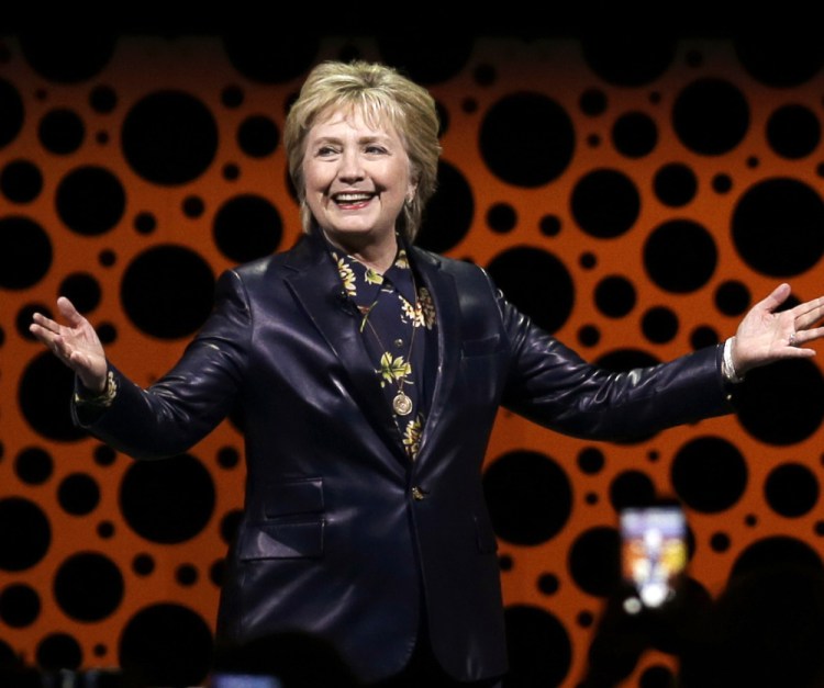 Former Secretary of State Hillary Clinton gestures while speaking before the Professional Businesswomen of California in San Francisco in March.