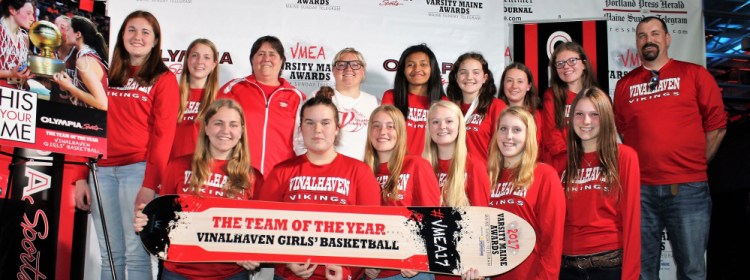 The girls' basketball team from Vinalhaven, Class D state champions, accepts its Team of the Year award at the Varsity Maine Awards.