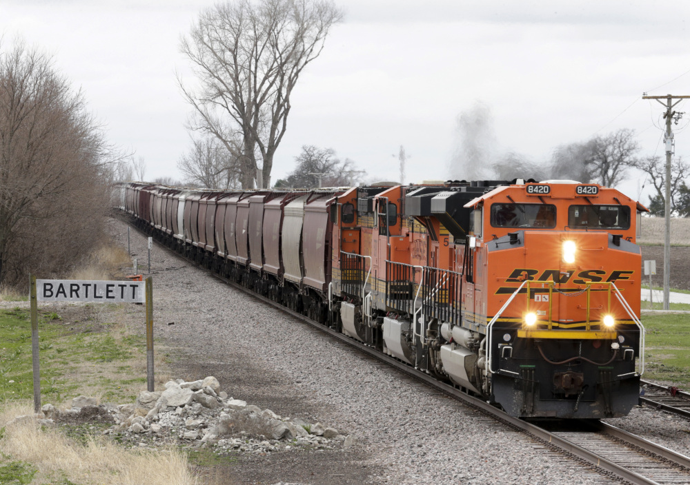 A BNSF Railway train transports grain through Bartlett, Iowa, last month. In 2016, the U.S. ran a more than $20 billion trade surplus in agricultural products. President Trump has vowed to redo the North American Free Trade Agreement, but NAFTA has widened access to Mexican and Canadian markets, boosting U.S. farm exports.