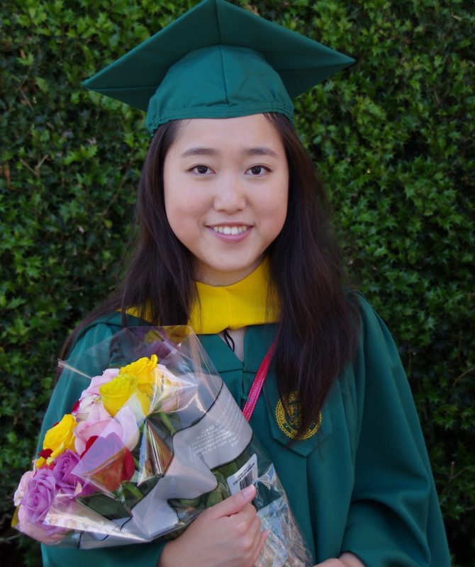 Seventeen-year-old Stephanie Mui celebrates the master's degree she earned at George Mason University's 50th commencement last week.