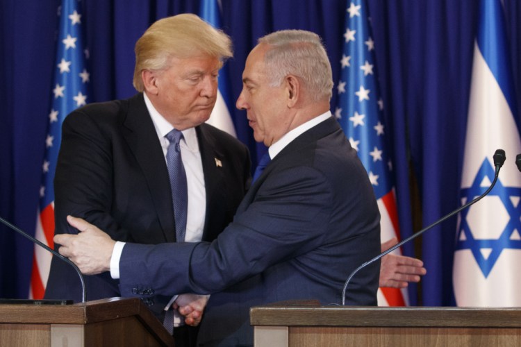 President Trump shakes hands with Israeli Prime Minister Benjamin Netanyahu after making a joint statement in Jerusalem on Monday.
