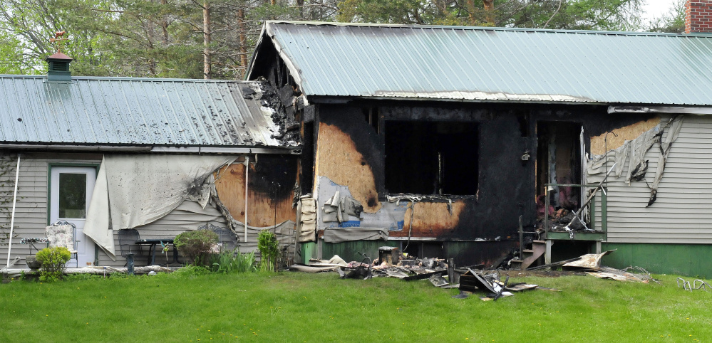 The rear section of Sumner A. "Bud" Jones Jr.'s home on Peltoma Avenue in Pittsfield was damaged in a fire on Tuesday.