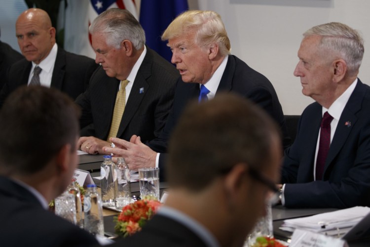 Donald Trump flanked by National Security Adviser H.R. McMaster, Secretary of State Rex Tillerson and Secretary of Defense Jim Mattis at a meeting at European Union headquarters on Thursday.