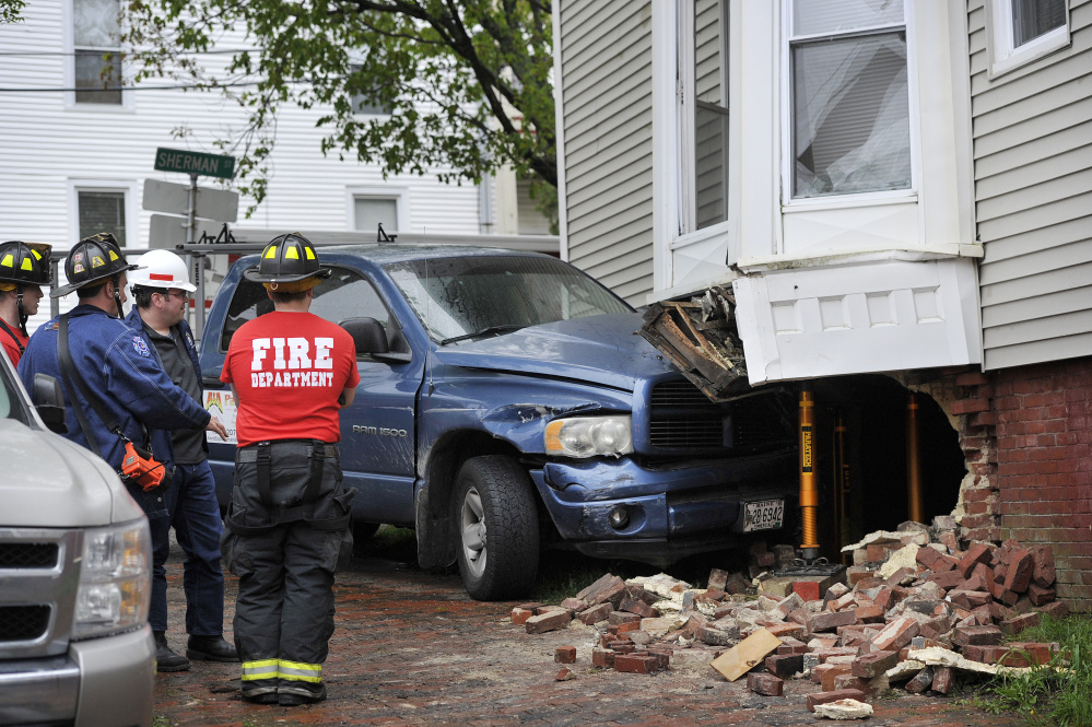 PORTLAND, ME - MAY 25: A pickup truck crashed into a building at High and Sherman streets in Portland on Friday, May 26, 2017. (Staff photo by Shawn Patrick Ouellette/Staff Photographer)