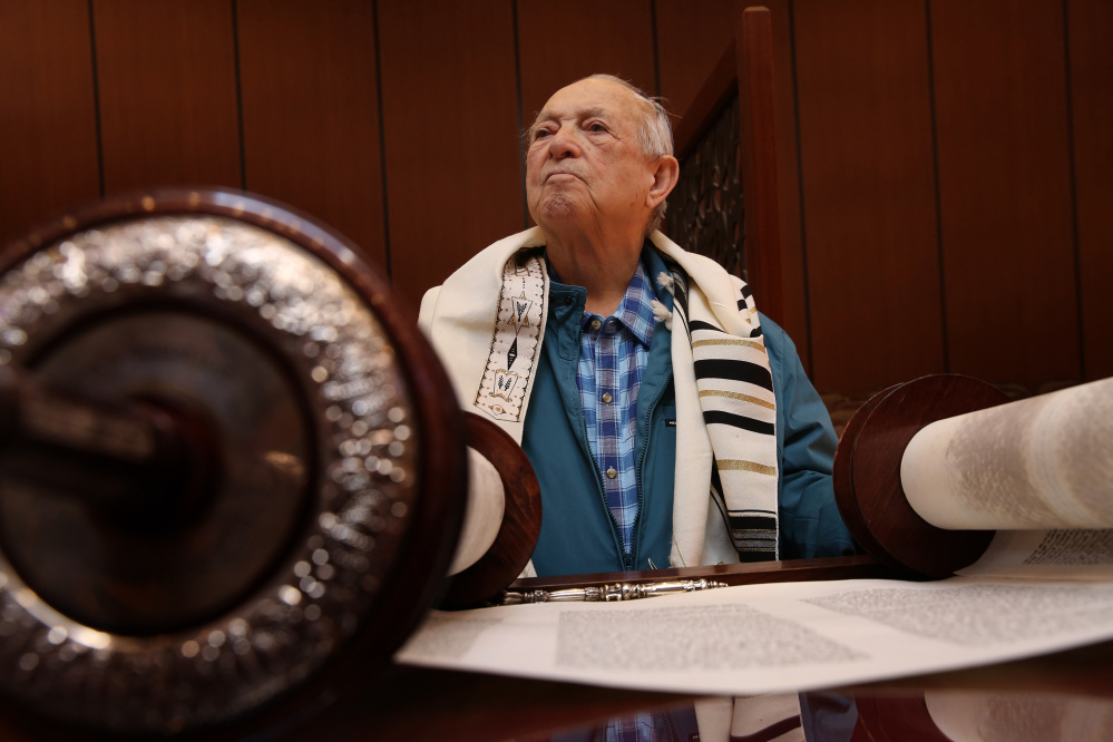 Harold Katz practices his torah portion on May 18 at the Lubavitch Chabad Synagogue in Wilmette, Ill.. He survived several captures and many dangers during the Holocaust.
