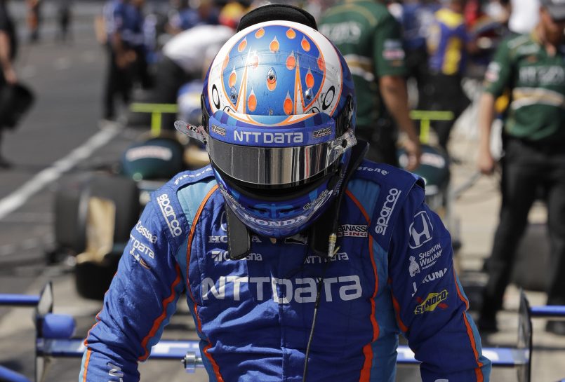 Scott Dixon of New Zealand posted the fastest qualifying time in 21 years at Indianapolis Motor Speedway. He will start from the pole for Sunday's Indianapolis 500. He won the race in 2008.