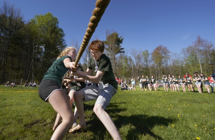 Karlee Barry, left, Blake Proctor and other Latin Club members from Leavitt Area High School in Turner participate in a tug-of-war competition at the Maine Junior Classical League's spring convention at Camp Mechuwana in Winthrop.