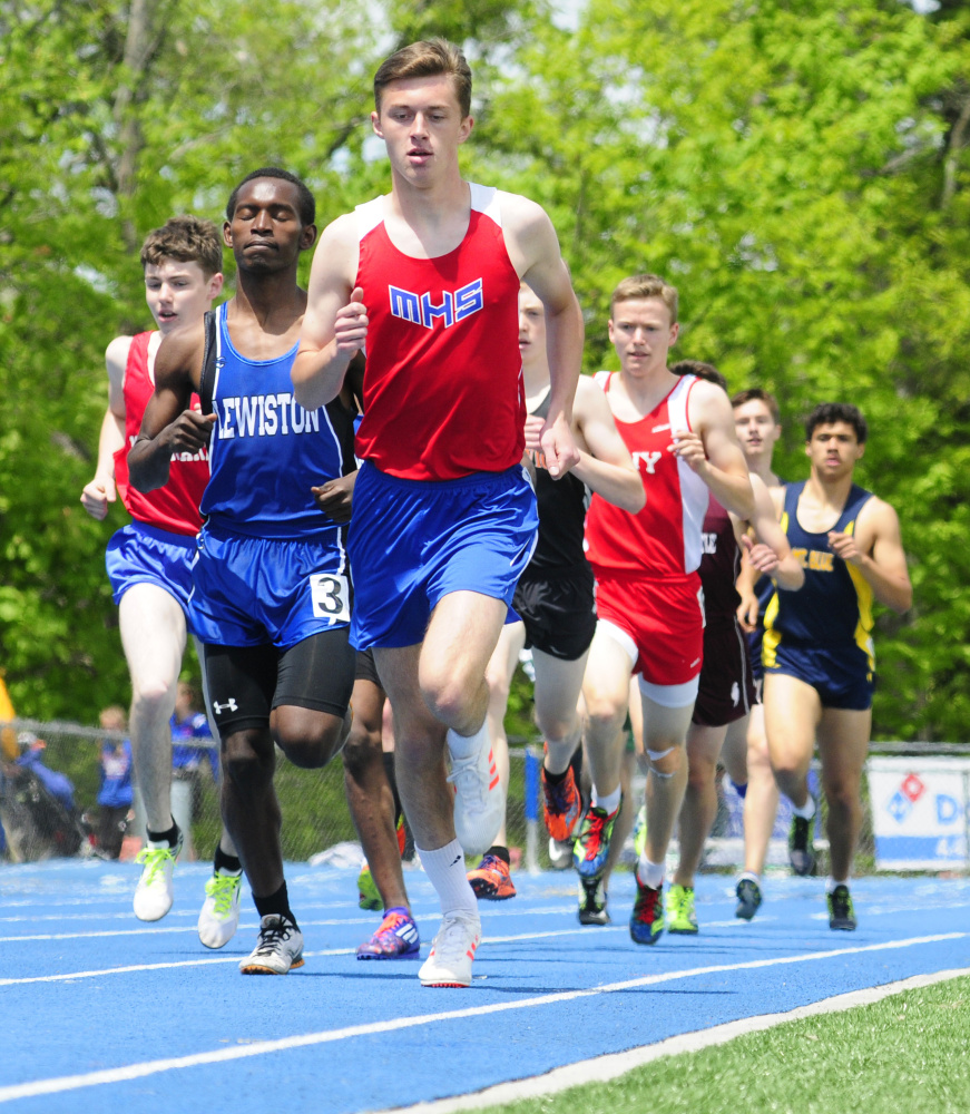 Messalonskee's Owen Concaugh leads the 1,600 meters at the Kennebec Valley Athletic Conference track and field championships Saturday at McMann Field in Bath.