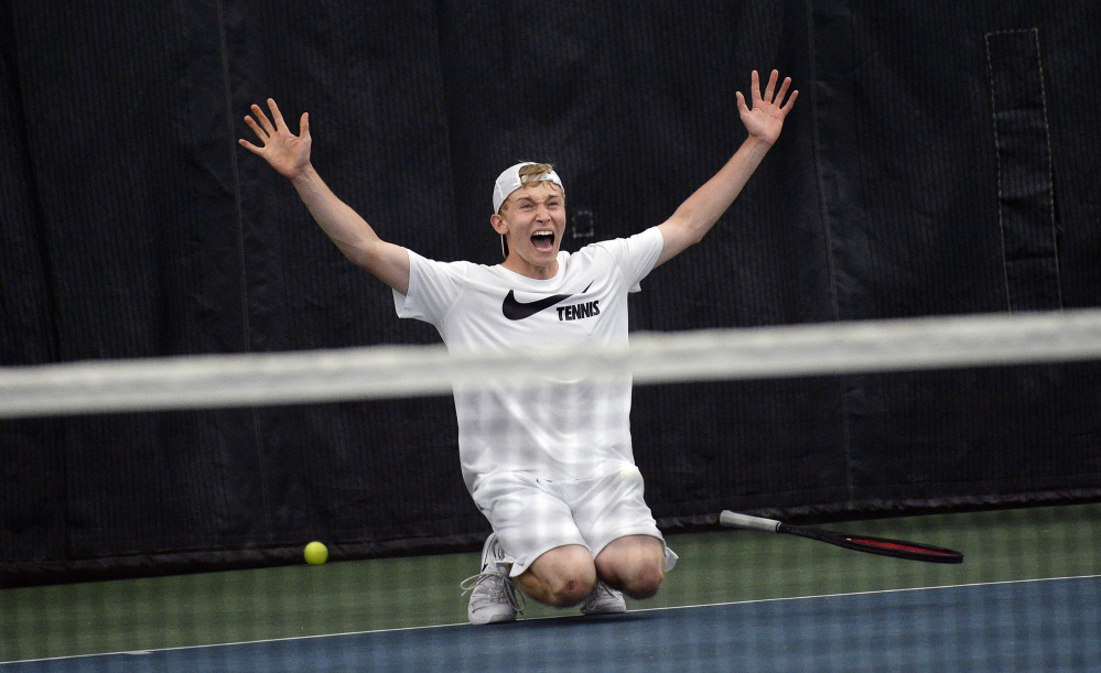 Nick Mathieu of Mt. Ararat celebrates after he defeated Falmouth's Nick Forester in three sets Monday to win his second straight singles state championships.