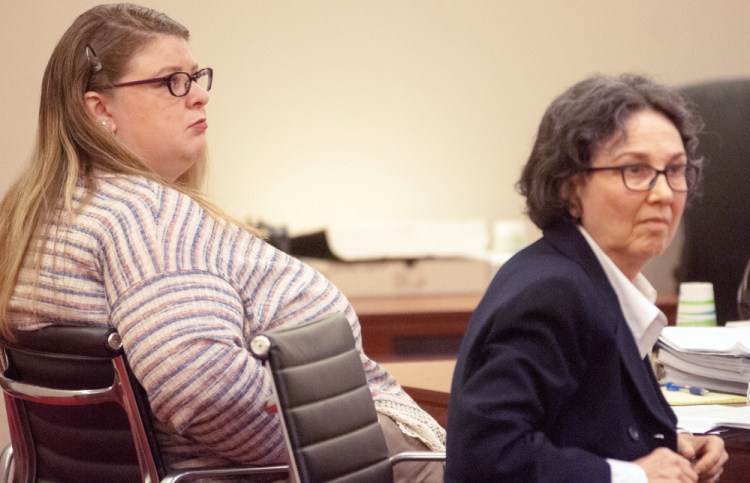 Sarah Conway, left, sits with her attorney, Sherry Tash, at the Capital Judicial Center in Augusta on the opening day of her trial Tuesday on a charge of gross sexual assault on a child.