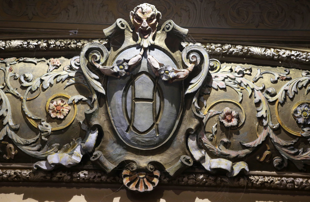In this Tuesday, May 23, 2017 photo, an architectural detail rests on the proscenium arch in the Newport Opera House, in Newport, R.I. Vacant for years, the Newport Opera House is being restored and reopened. The nonprofit group that owns it hopes to make it into a centerpiece of live performance in the resort town already known for its jazz and folk festivals. (AP Photo/Steven Senne)