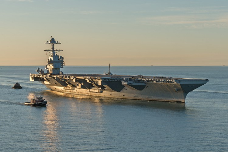 The aircraft carrier USS Gerald R. Ford pulls into the Navy shipyard in Norfolk, Va., for the first time on April 14. The first new U.S. aircraft carrier design in 40 years, the ship spent several days conducting sea trials of many of its key systems. 