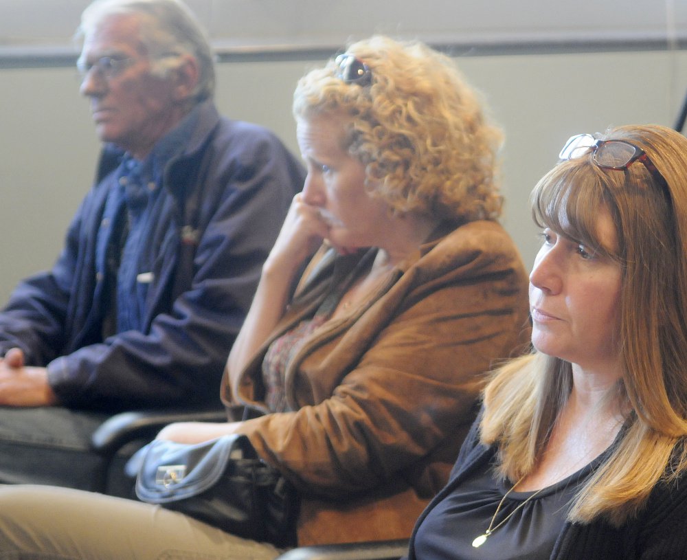 Friends and relatives of three people killed in a 1996 car crash listen to testimony on Sept. 26, 2016, by Bryan Carrier at the Bureau of Motor Vehicles in Augusta where Carrier asked to have his driver's license restored. Carrier was convicted of manslaughter in the accident and his driving privileges revoked for life. From left are Royce "Butch" Jewell, who lost his wife, Arlyce, and 10-year-old son, Alex, in the crash; Jewell's partner, Tanya Morris of Canaan; and Tracey Rotondi of Athens, the daughter of Jewell and Arlyce and sister of Alex.