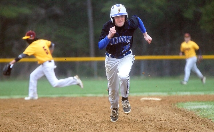 Falmouth senior Will Blum makes a dash for third base against Cape Elizabeth on Monday afternoon.