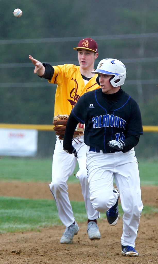 Falmouth's Cam Guarino runs back toward first base after getting stuck in a rundown. Cape Elizabeth shortstop Finn Bowe made the throw to Ryan Weare, who tagged Guarino out. Guarino fared much better on the mound, throwing a no-hitter.